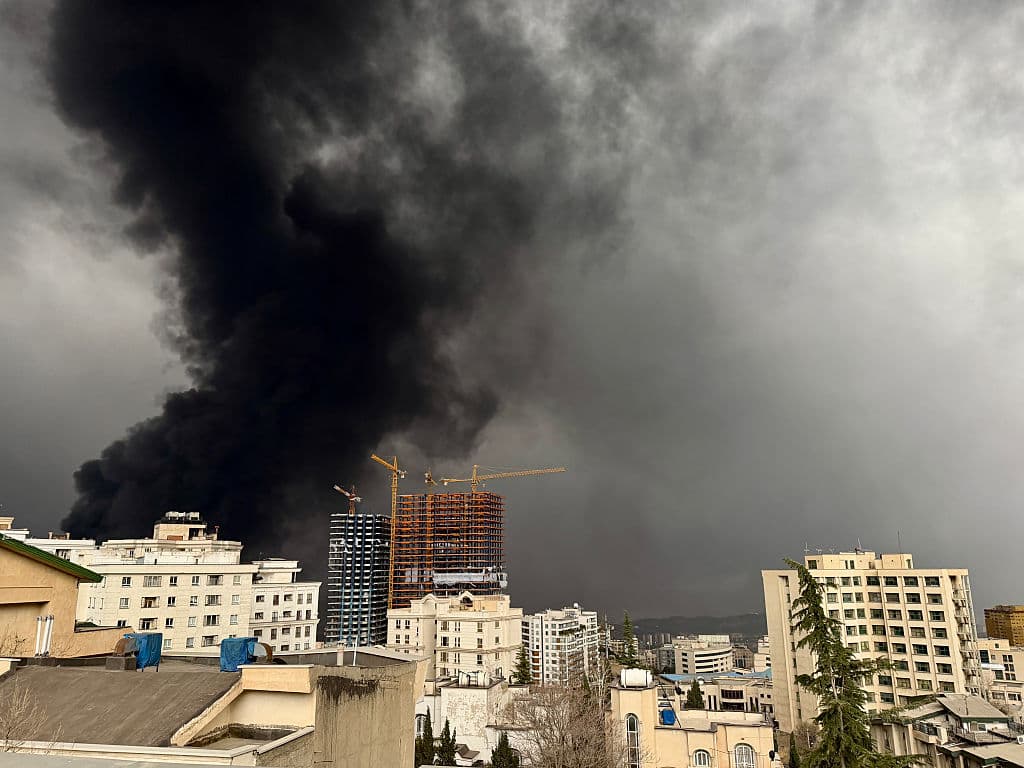 US and Israel Bomb Tehran Oil Depots, Blanket City With Toxic Smoke and Oil Rain